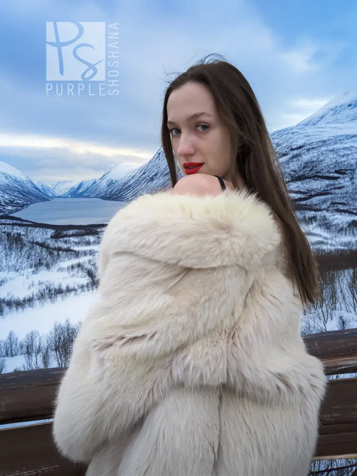 Cream plush fur jacket with raised collar and fluffy shoulder detail