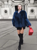 Vibrant blue faux fur jacket with full sleeves and front button closure