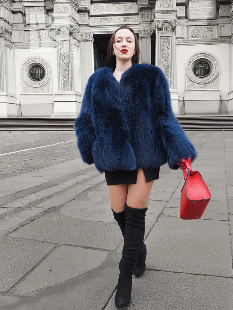 Vibrant blue faux fur jacket with full sleeves and front button closure