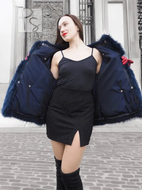 Blue faux fur jacket with wide sleeves and open front