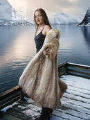 Tan coyote fur coat with shawl collar, long sleeves, open front, draped design