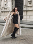 Long spotted plush fur coat with shawl collar, open front, beige base with dark speckling