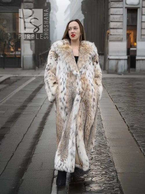 Spotted plush fur coat with shawl collar, long open front, cream and dark speckles