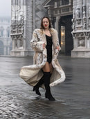 Long spotted plush fur coat with shawl collar, open sides, beige base with dark speckles