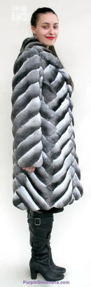 Genuine chinchilla fur coat, hooded gray with bold striped panel design, standing full length