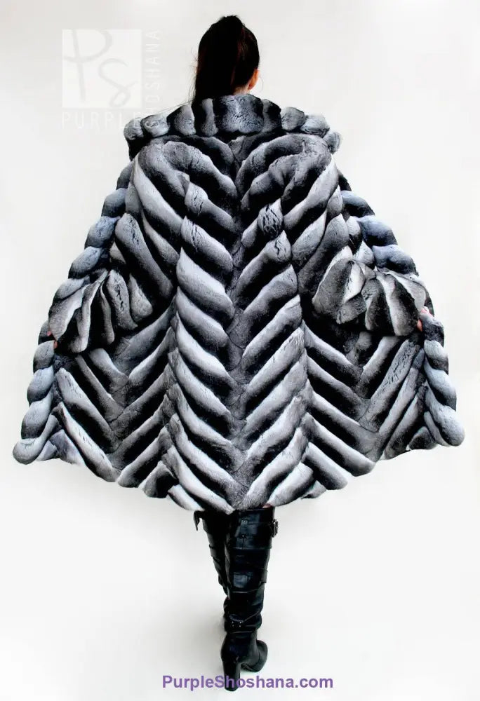 Genuine chinchilla fur coat, hooded gray with voluminous striped panels, back view