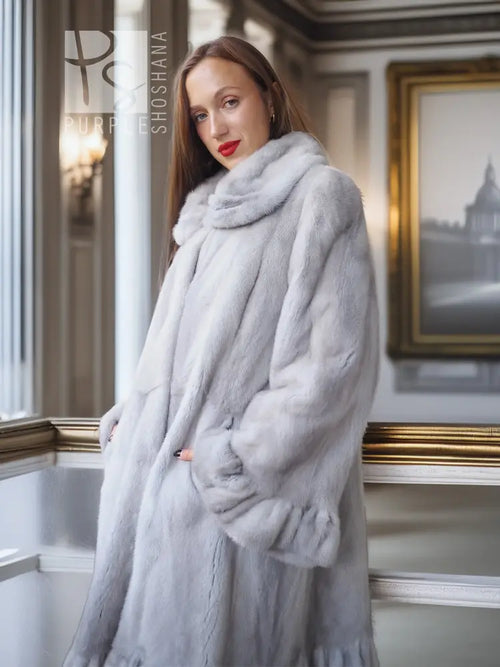 Light gray mink fur coat with petal collar and sculpted hem