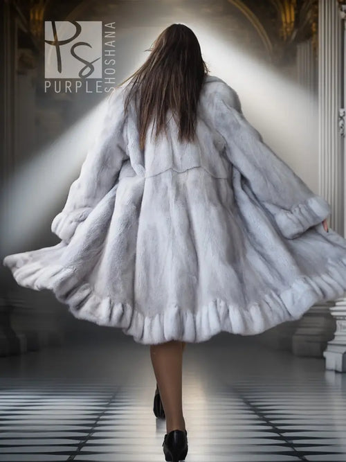 Light gray mink coat with petal collar, sculpted hem, back view
