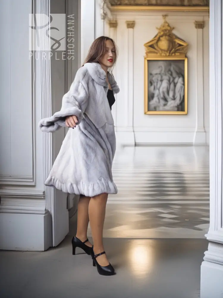 Light gray mink coat with petal collar, sculpted hem, front view