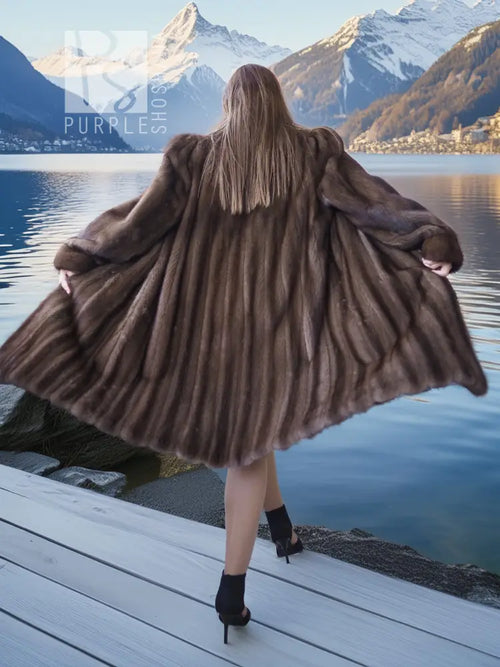 Dark brown fur hooded coat, back view with flared hem and hood down