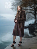 Dark brown fur hooded coat with long sleeves and front button placket