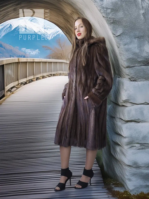 Brown fur hooded coat, front view with long sleeves and textured vertical nap
