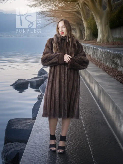 Dark brown fur hooded coat with button front and flared mid-thigh hem