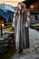 Gray fur coat with oversized hood and long silhouette, side view on walkway