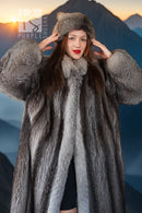 Gray raccoon fur coat with large hood and plush collar; close-up of hood and face