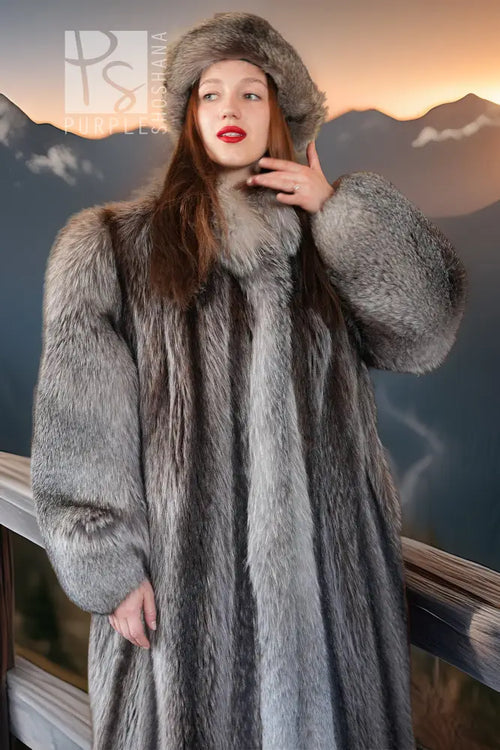 Grey raccoon fur coat with oversized hood and statement fur cuffs