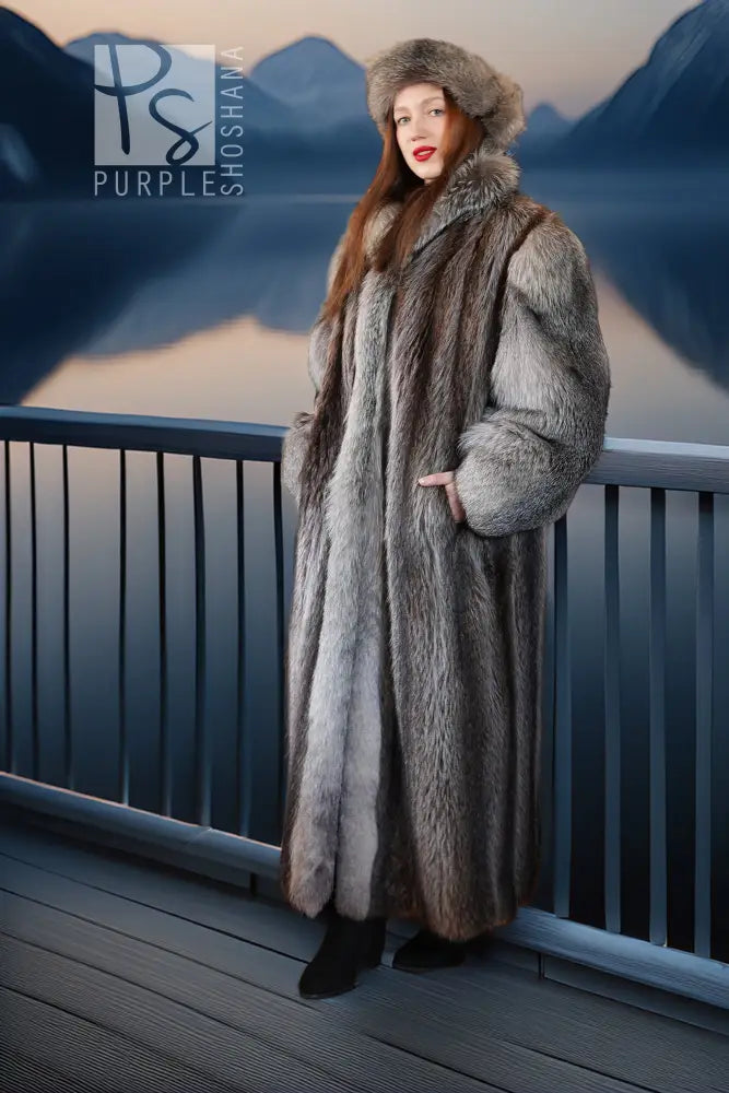 Long gray raccoon fur coat with high hood and plush fur collar; side view