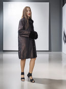 Reversible mink jacket with dark satin outer and dark fur collar and cuff accents