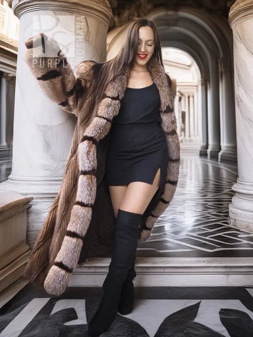 Mink and fox fur coat, striped panel design, taupe and dark brown, worn with tall black boots