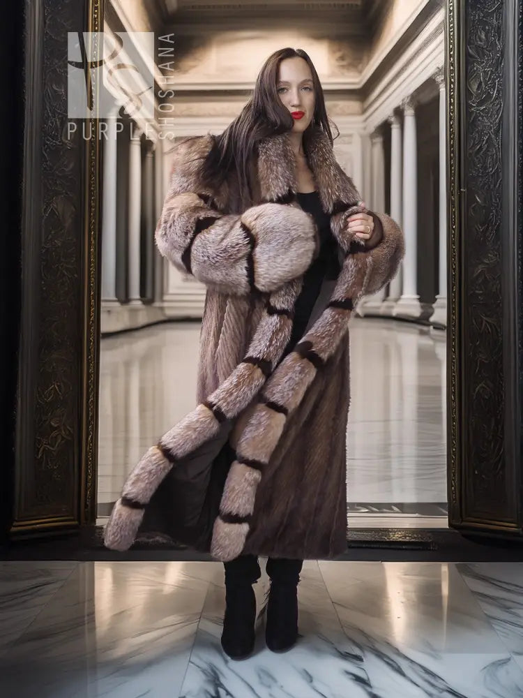Front view of full-length striped mink fur coat with hood, wide collar, and cropped cuffs
