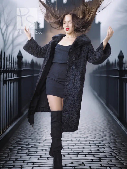 Dark long coat with mink fur collar and button closure, textured lamb look