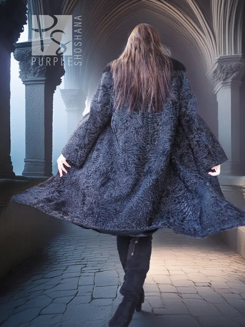 Dark lamb fur coat with fur collar, open back view and long swishing hem