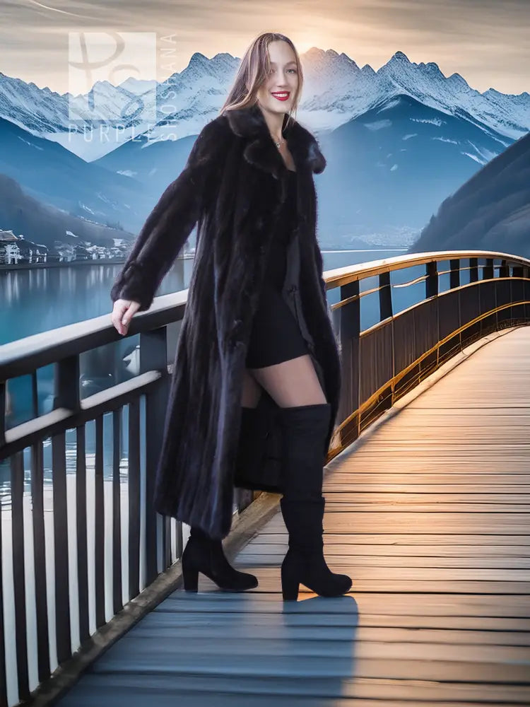Black mink long coat with wide lapel and belted-like waistline, paired with beret
