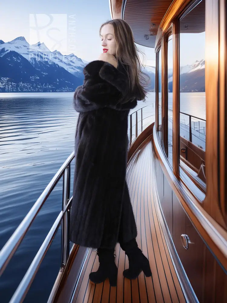 Black mink coat with thick collar and matching beret, full-length view