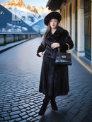 Black mink coat ensemble with beret, long fur coat, front view with black handbag