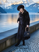 Black mink coat ensemble with beret, long dark fur coat, holding a black handbag outdoors