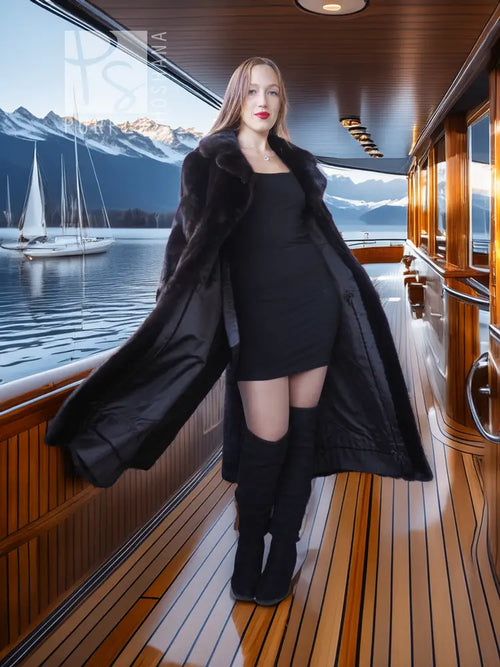 Black mink coat with wide collar and short skirt hem, worn with matching beret