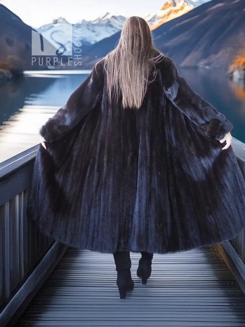 Black mink coat from behind with full, flared skirt and matching beret
