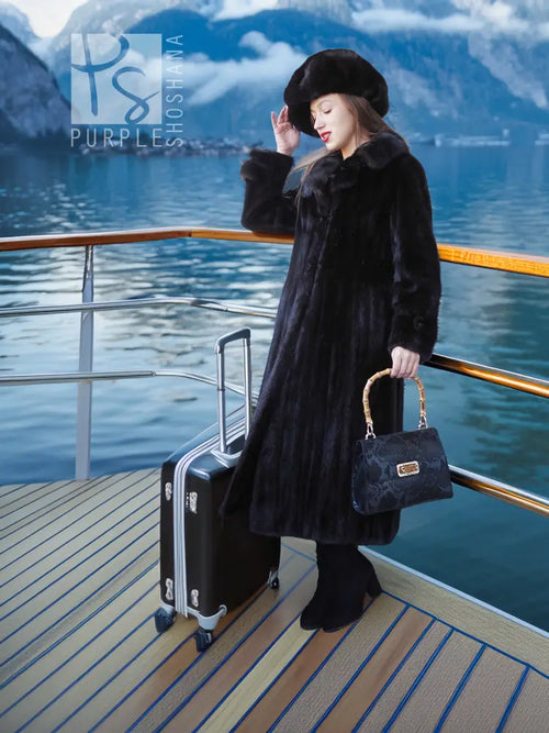 Black mink coat and beret ensemble with a cinched waist and flared skirt