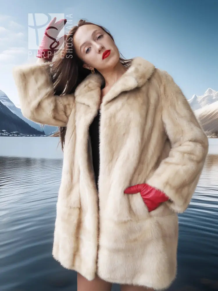 Light cream faux mink fur coat with red inner cuffs, collar wide and relaxed fit