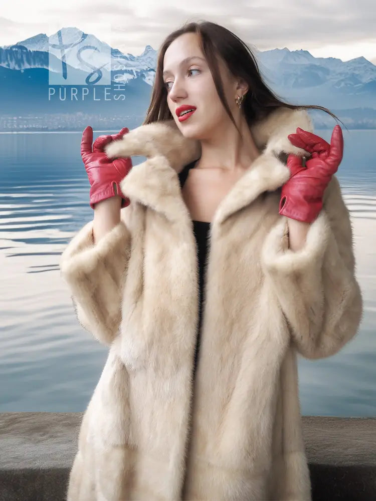 Cream mink fur coat with red gloves, open collar, close-up