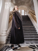 Vintage mink fur coat with pale fox-fur collar, full-length side view on staircase.