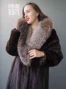 Vintage mink fur coat with light gray fox fur collar, close-up at shoulders