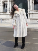 Cream chevron mink coat with soft collar, textured front panels, roomy fit