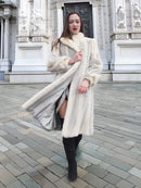 Full-length chevron mink coat in ivory with long sleeves and side slit