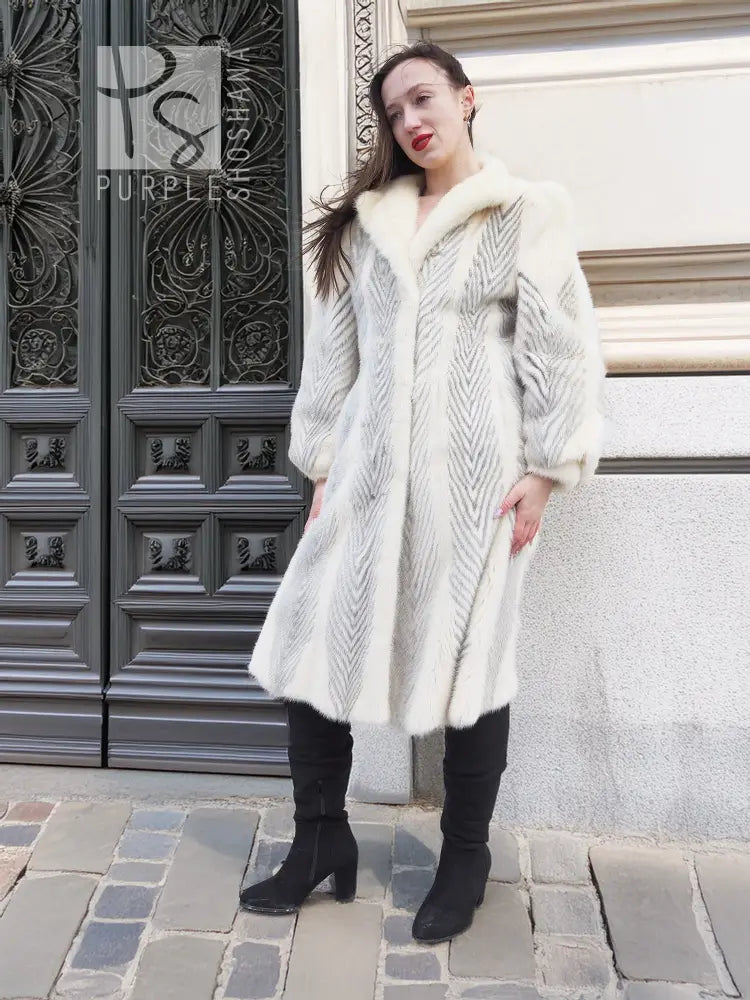 Full-length cream chevron mink coat with wide collar and textured chevron panels