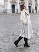 Full-length mink coat in light cream with chevron herringbone pattern and fur collar, front view