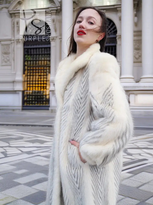 Cream chevron mink coat with thick fur collar and long sleeves, front view
