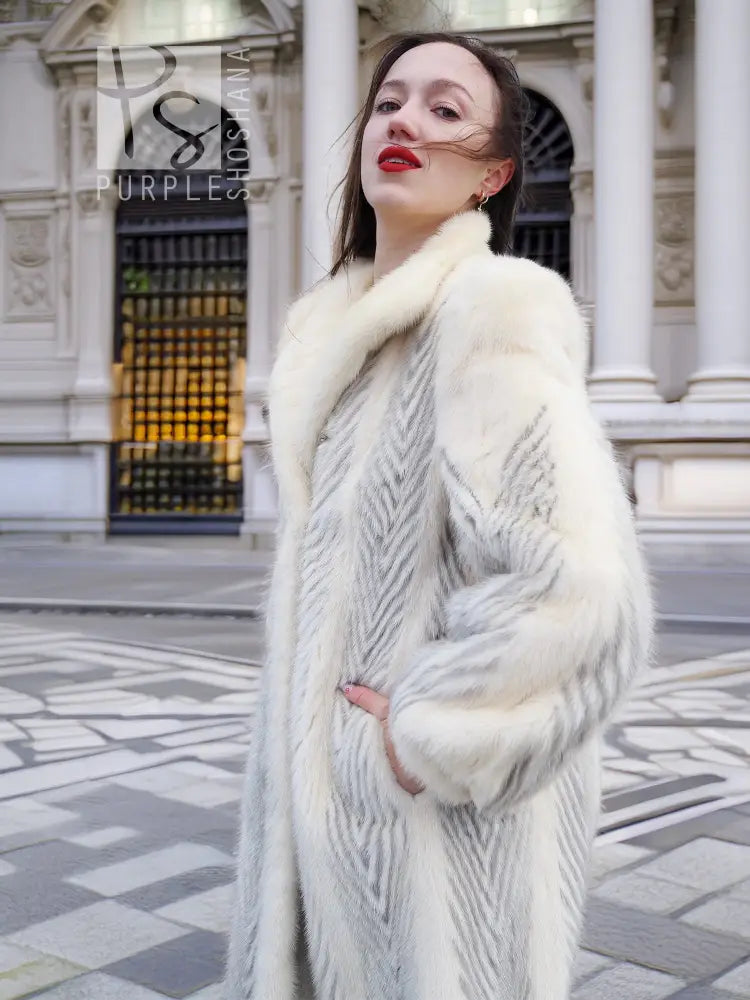 Cream chevron mink coat with thick fur collar and long sleeves, front view