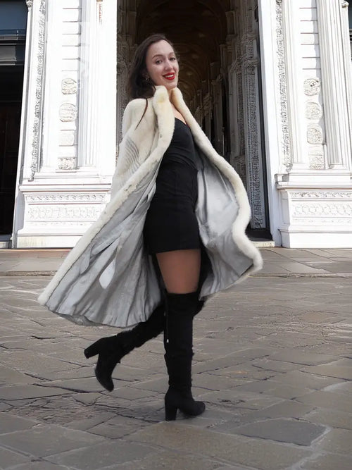 Cream full-length chevron mink coat with plush collar and flared, draped hem