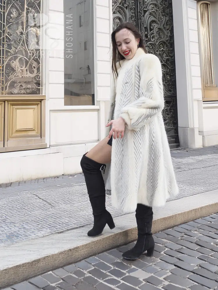 Full-length ivory chevron mink coat with textured fur, long sleeves and cuff detail