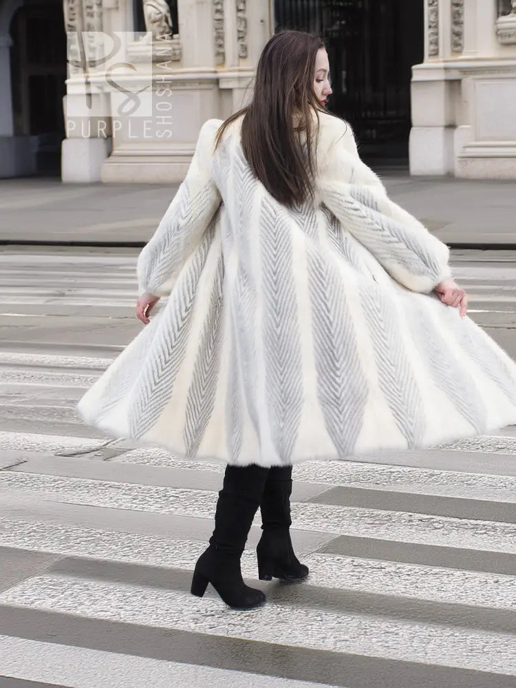 Full-length mink coat in light cream with chevron herringbone texture, long sleeves