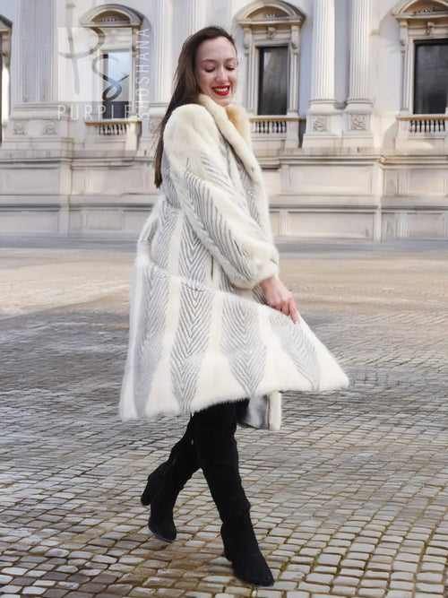 Full-length cream chevron mink coat with bold herringbone texture