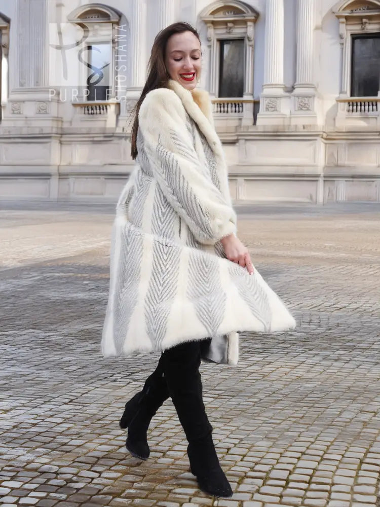 Full-length cream chevron mink coat with bold herringbone texture
