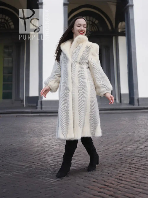 Ivory chevron mink coat with stand collar, textured pattern and full-length silhouette