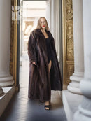 Full-length mahogany mink fur coat with open front and soft, textured fur.